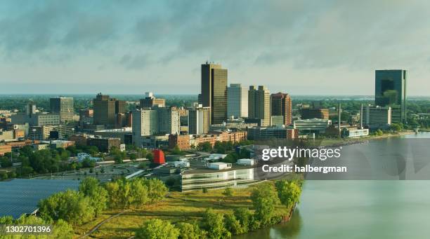 morning sunlight shining on downtown toledo, ohio - antenne - ohio stock-fotos und bilder