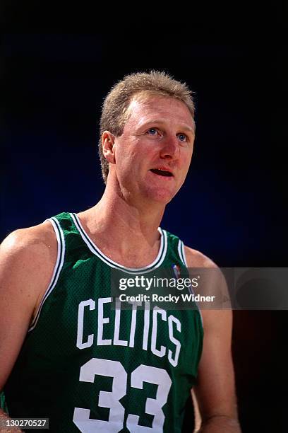 Larry Bird of the Boston Celtics looks on against the Sacramento Kings on March 12, 1991 at Arco Arena in Sacramento, California. NOTE TO USER: User...