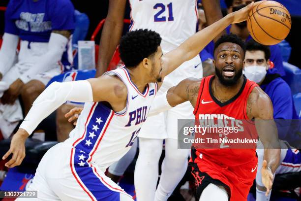 David Nwaba of the Houston Rockets reaches watches the ball during the fourth quarter against the Philadelphia 76ers at Wells Fargo Center on...