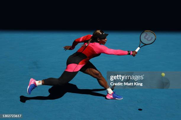 Serena Williams of the United States plays a backhand in her Women’s Singles Semifinals match against Naomi Osaka of Japan during day 11 of the 2021...