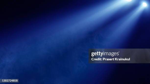 stage spotlight with laser rays. concert lighting background - blue concert light stock pictures, royalty-free photos & images