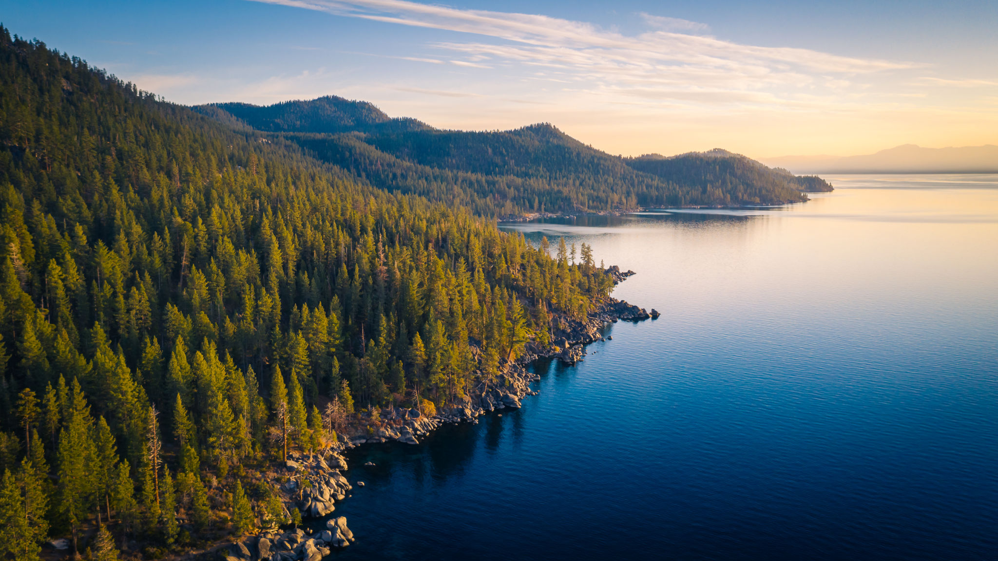 Aerial View of Lake Tahoe Shoreline with Mountains and Turquoise Blue Waters Aerial View of Lake Tahoe Shoreline with Mountains and Turquoise Blue Waters