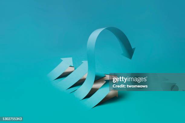 success overturned concept still life. - simple line graph stock pictures, royalty-free photos & images