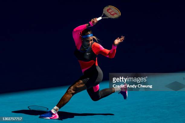 Serena Williams of the United States plays a forehand in her Women’s Singles Semifinals match against Naomi Osaka of Japan during day 11 of the 2021...