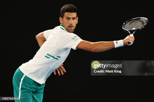 Novak Djokovic of Serbia plays a backhand in his Men’s Singles Semifinals match against Aslan Karatsev of Russia during day 11 of the 2021 Australian...