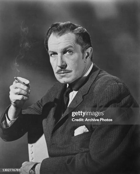 American actor Vincent Price smoking a cigarette, US, 1971. News Photo