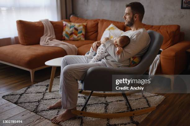 single dad bonding with his baby daughter - father and baby stock pictures, royalty-free photos & images