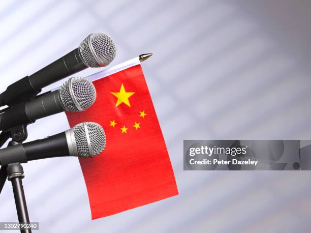 chinese flag and mics - censorship imagens e fotografias de stock