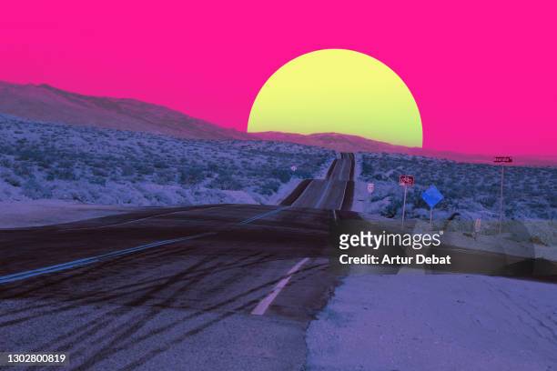 surreal colorful desert with straight road heading to stunning big sun. - american road trip stock pictures, royalty-free photos & images