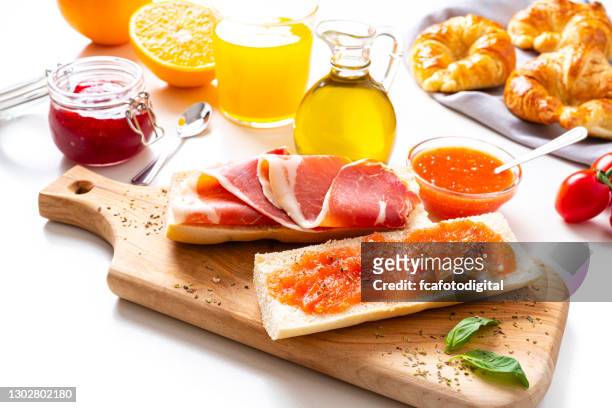 mediterranean breakfast on white table - tostada stock pictures, royalty-free photos & images