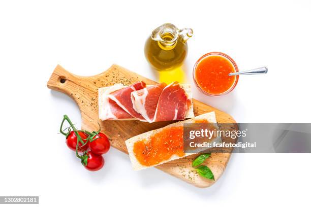 breakfast: spanish tomato and ham toast with olive oil shot from above - tapas spain stock pictures, royalty-free photos & images