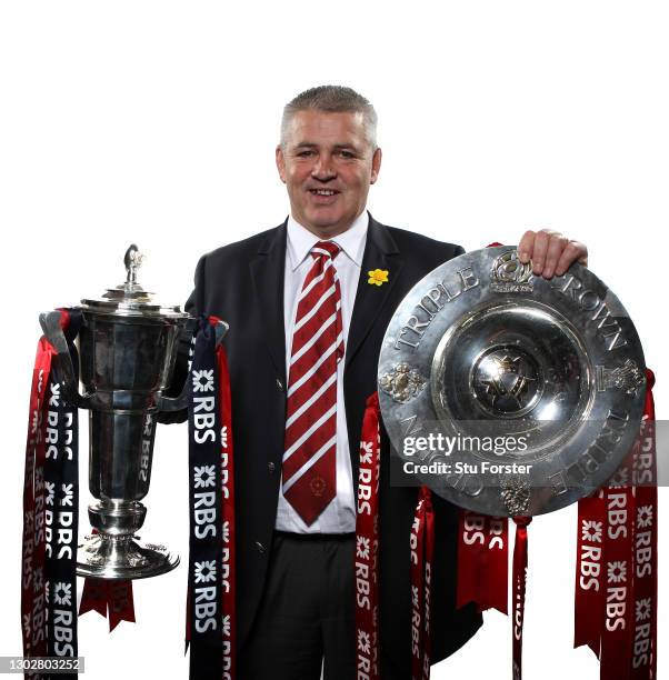 Wales head coach Warren Gatland pictured with the Triple Crown and Six Nations Trophy after the RBS 6 Nations Championship match between Wales and...
