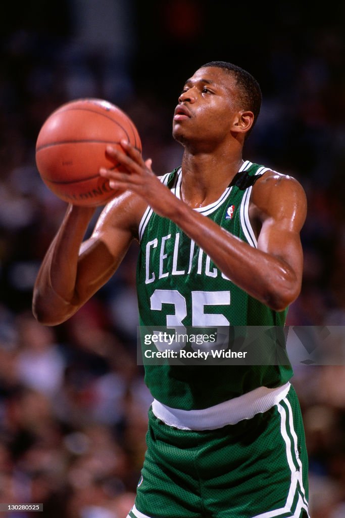 Reggie Lewis Reggie Lewis of the Boston Celtics shoots a free-throw against the ...