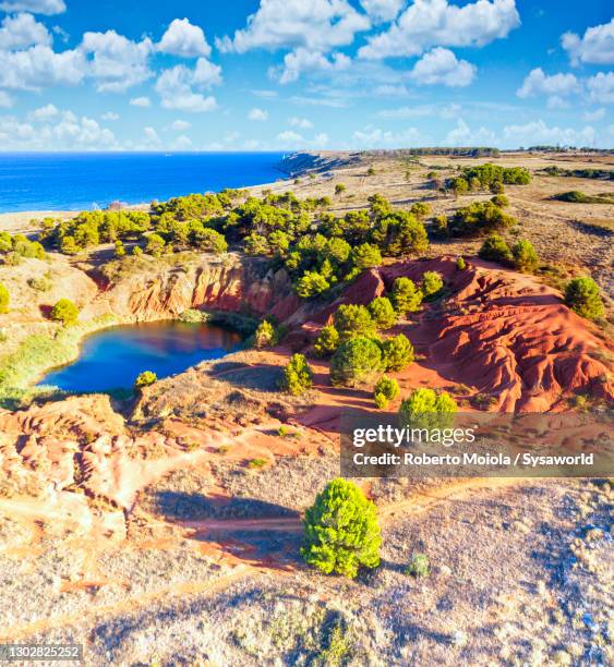 bauxite quarry and lake, otranto, italy - salento apulia stock pictures, royalty-free photos & images