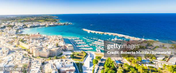 seaside town of otranto by turquoise sea, apulia, italy - otranto stock pictures, royalty-free photos & images