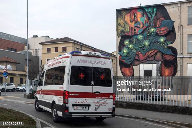 An ambulance of the Italian Red Cross is pictured driving in the streets on February 18, 2021 in Bergamo, Italy. The northern Italian province of...