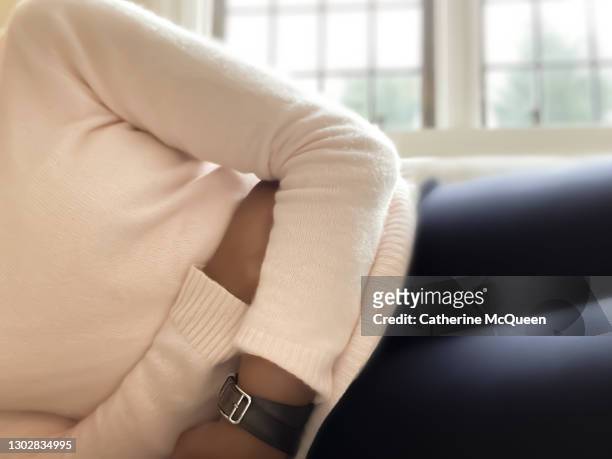 african-american woman experiences stomach pain - vomit stock pictures, royalty-free photos & images