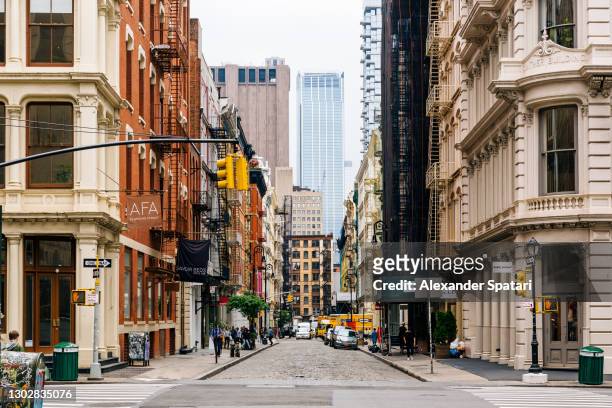 soho shopping district, new york city, usa - street stock pictures, royalty-free photos & images