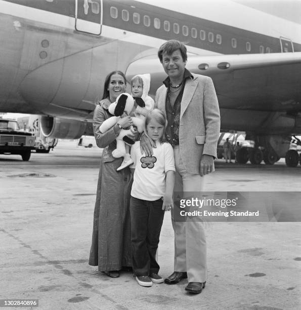 Married American actors Natalie Wood and Robert Wagner with her daughter Natasha and his daughter Katie at Heathrow Airport in London, UK, 4th August...
