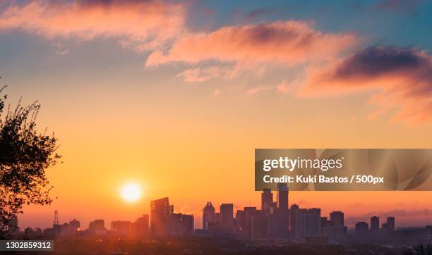 silhouette of buildings against sky during sunset,austin,texas,united states,usa - austin fotografías e imágenes de stock