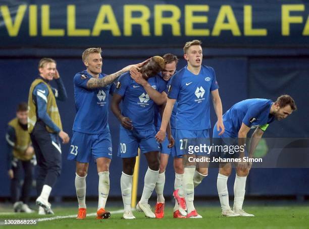 David Datro Fofana of Molde celebrates with team mates after scoring his team's 3rd goal during the UEFA Europa League Round of 32 match between...