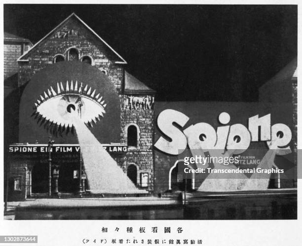 Lithographic plate features an image of the exterior of the Ufa-Palast am Zoo cinema , decorated and illuminated for a screening of Fritz Lang's film...