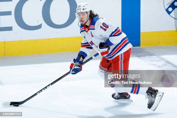 Artemi Panarin of the New York Rangers looks for a teammate during the first period against the Philadelphia Flyers at Wells Fargo Center on February...