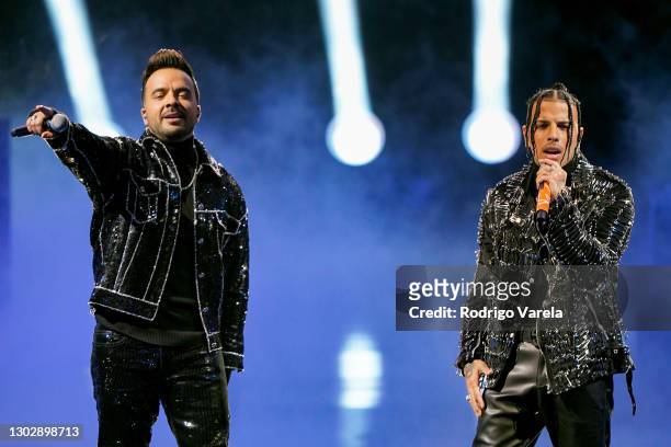 Luis Fonsi and Rauw Alejandro perform onstage during Univision's 33rd Edition of Premio Lo Nuestro a la Música Latina at AmericanAirlines Arena on...