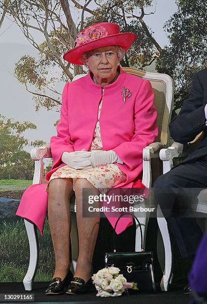 Queen Elizabeth II looks on as she listens to speeches during the opening of the new Royal Children’s Hospital on October 26, 2011 in Melbourne,...