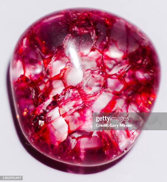 red stone rock gem  pebble close up red stone rock gem  pebble close up - semi precious gem stock pictures, royalty-free photos & images