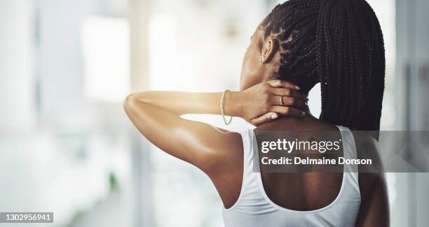 give your neck a break with a standing workout - neckache stock pictures, royalty-free photos & images