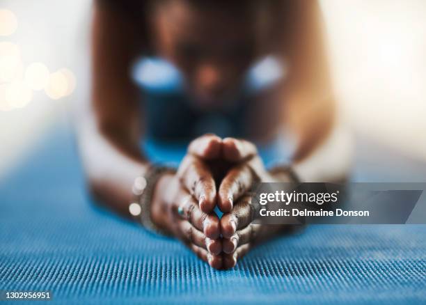 on the path to inner peace - black woman yoga stock pictures, royalty-free photos & images