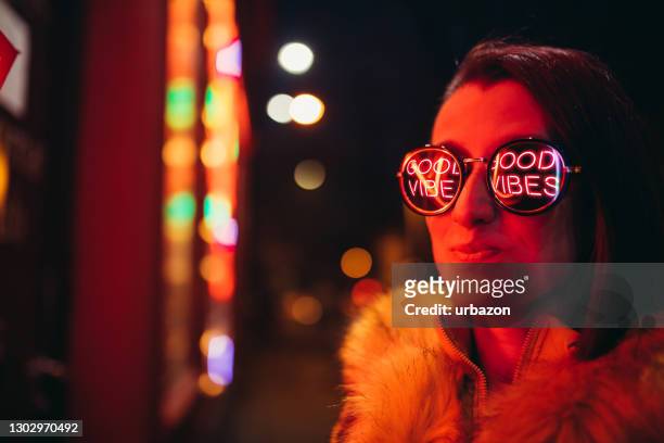 woman and neon light - creative people outside imagens e fotografias de stock