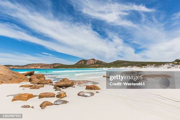 rocks on sandy beach and turquoise sea, cape le grand national park, australia - beach western australia bildbanksfoton och bilder