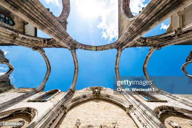 portugal, lisbon, sky seen through carmo convent ruins - convento foto e immagini stock