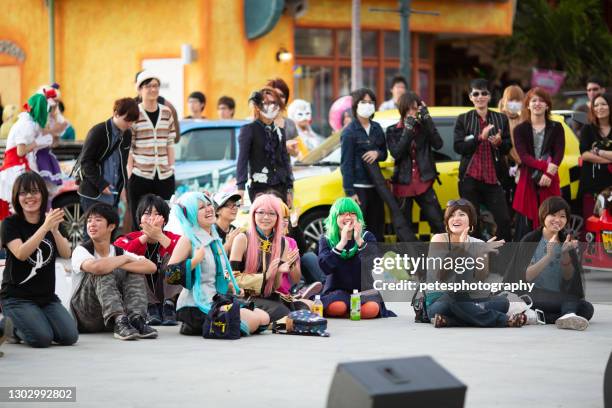 young cosplay japanese kids happy and clapping - cosplay stock pictures, royalty-free photos & images