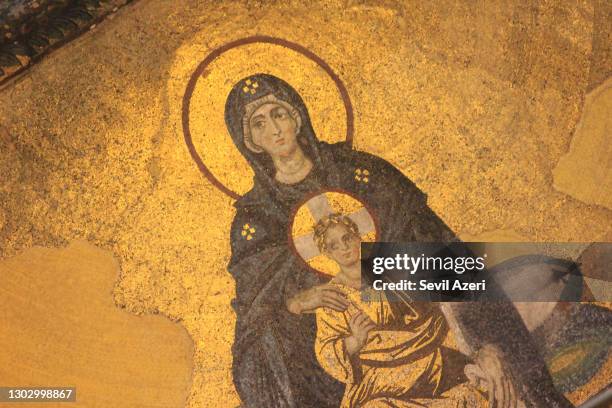 the virgin mary and jesus mosaic on the wall in hagia sophia mosque, close-up - virgin mary stock pictures, royalty-free photos & images