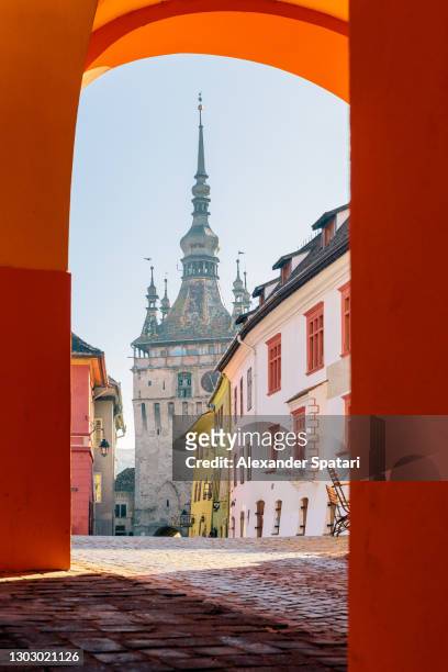 turnul cu ceas clock tower in sighisoara, romania - romania stock pictures, royalty-free photos & images