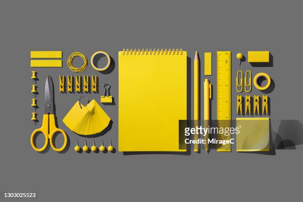 yellow stationery collection knolling on gray - knolling tools stock pictures, royalty-free photos & images