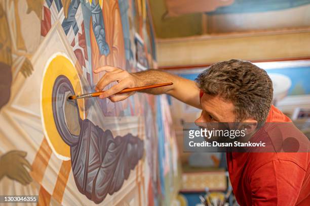 an artist painting frescos - restoring art stock pictures, royalty-free photos & images