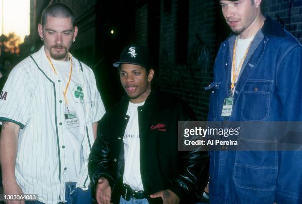 June 19: Rapper Eazy-E hangs out backstage with House of Pain after they perform at The Ritz on June 19, 1992 in New York City. (l to r: Everlast ;...