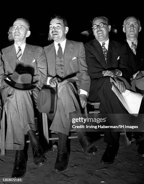 American lawyer, prosecutor, politician and Governor of New York Thomas E. Dewey watches the Heavyweight boxing match between Joe Louis and Tami...