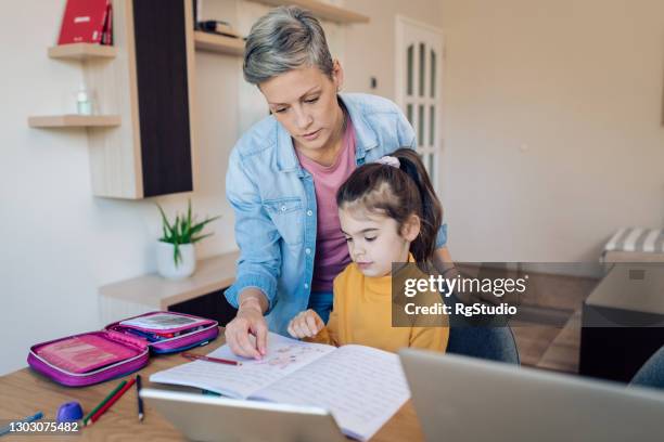 Homework Checking 858 Teacher Checking Homework Stock Photos, High-Res Pictures, and ...