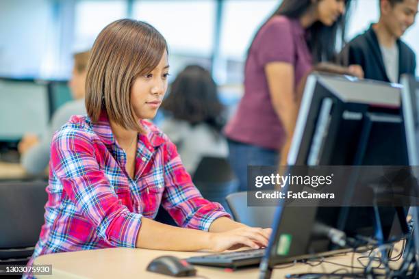 Indian Students In Computer Lab Photos and Premium High Res Pictures ...