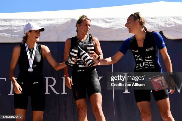 Maeve Kennedy-Birdsall, Hannah Wells and Rebecca Clarke celebrate on the podium during Challenge Wanaka on February 20, 2021 in Wanaka, New Zealand.