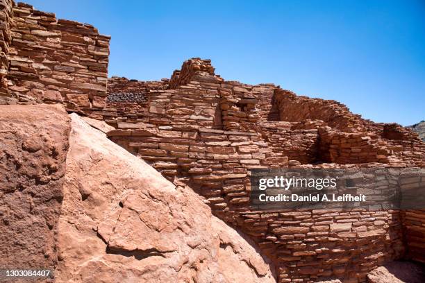 old native american pueblo ruins at wupatki national monument. - sinagua stock pictures, royalty-free photos & images