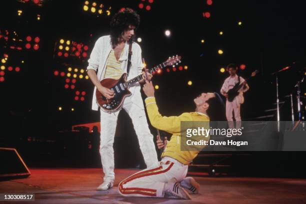 Singer Freddie Mercury and guitarist Brian May of British rock band Queen in concert at Wembley Stadium, July 1986.
