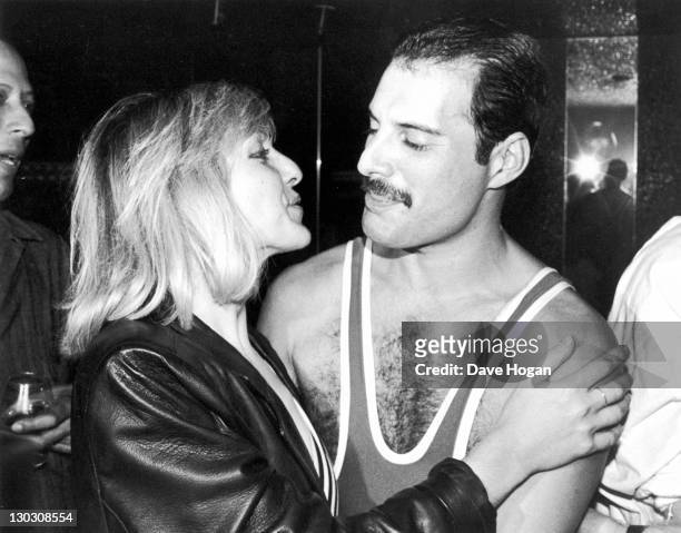 British singer, songwriter and record producer Freddie Mercury of British rock band Queen with his friend Mary Austin, during Mercury's 38th birthday...