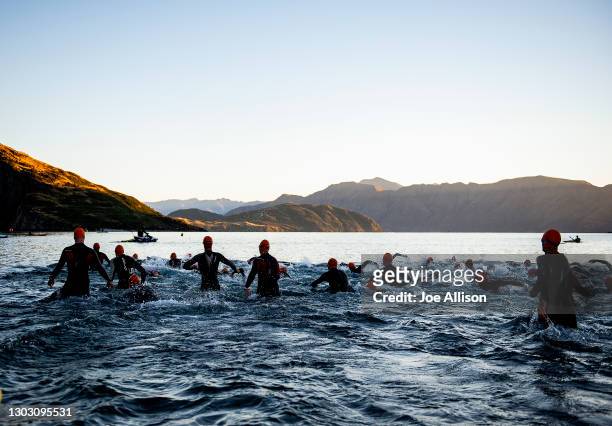 Competitors are seen swimming during Challenge Wanaka on February 20, 2021 in Wanaka, New Zealand.