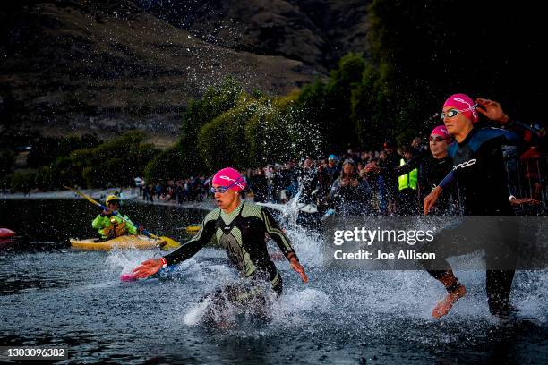 Hannah Wells and Maeve Kennedy-Birdsall embark on the swim leg during Challenge Wanaka on February 20, 2021 in Wanaka, New Zealand.